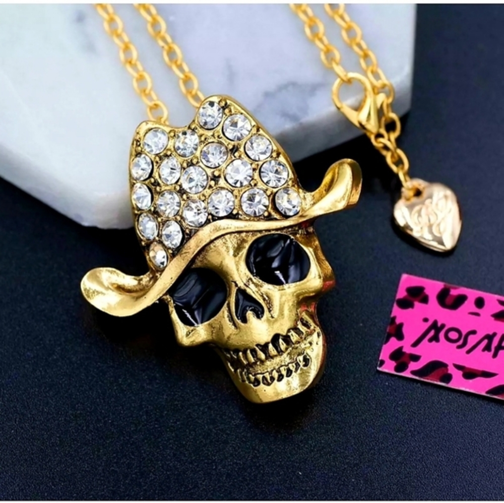 Gold plated white crystal skull with hat brooch